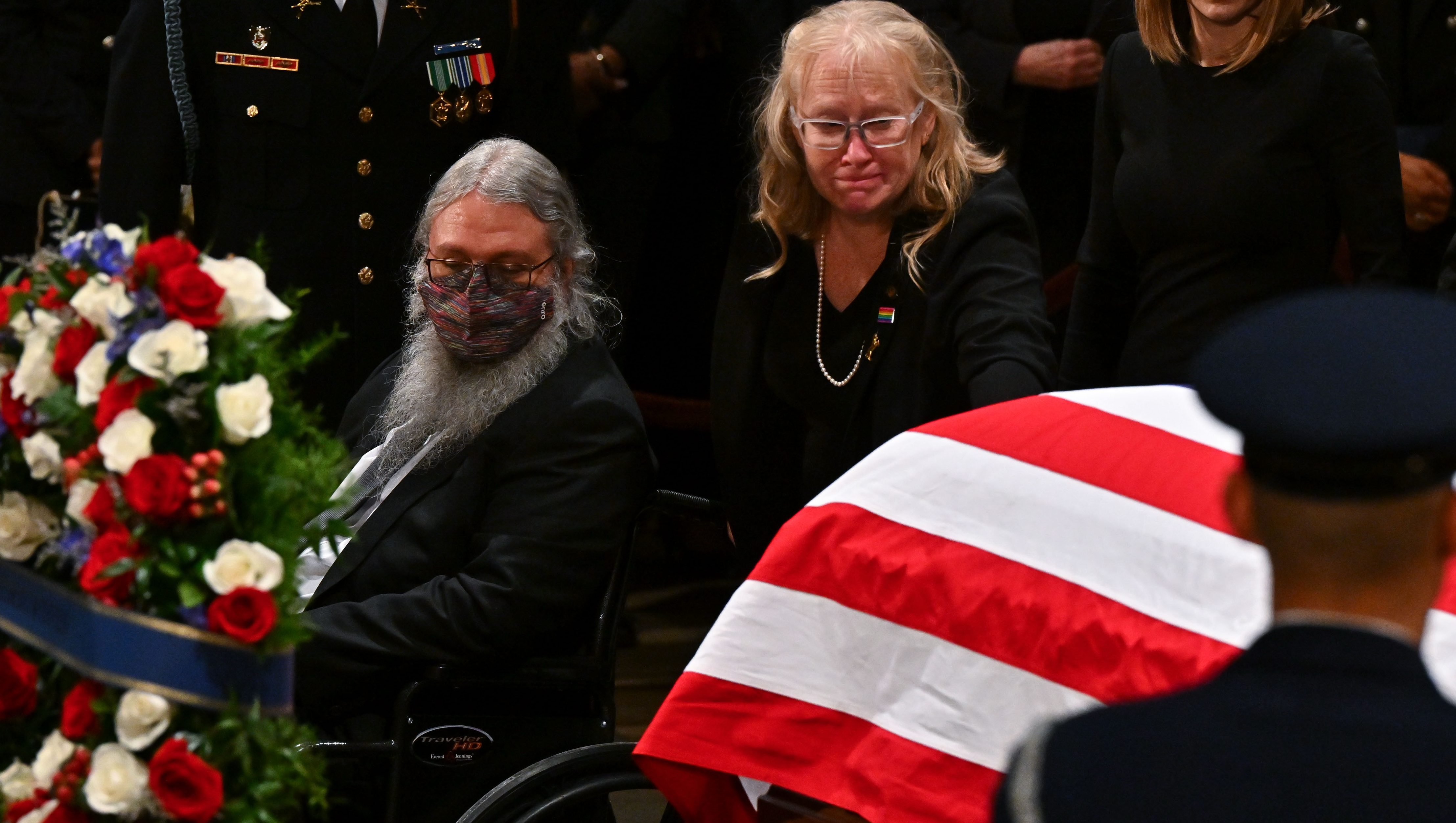 What Were Trump & Obama Talking About at Carter’s Funeral? Photos