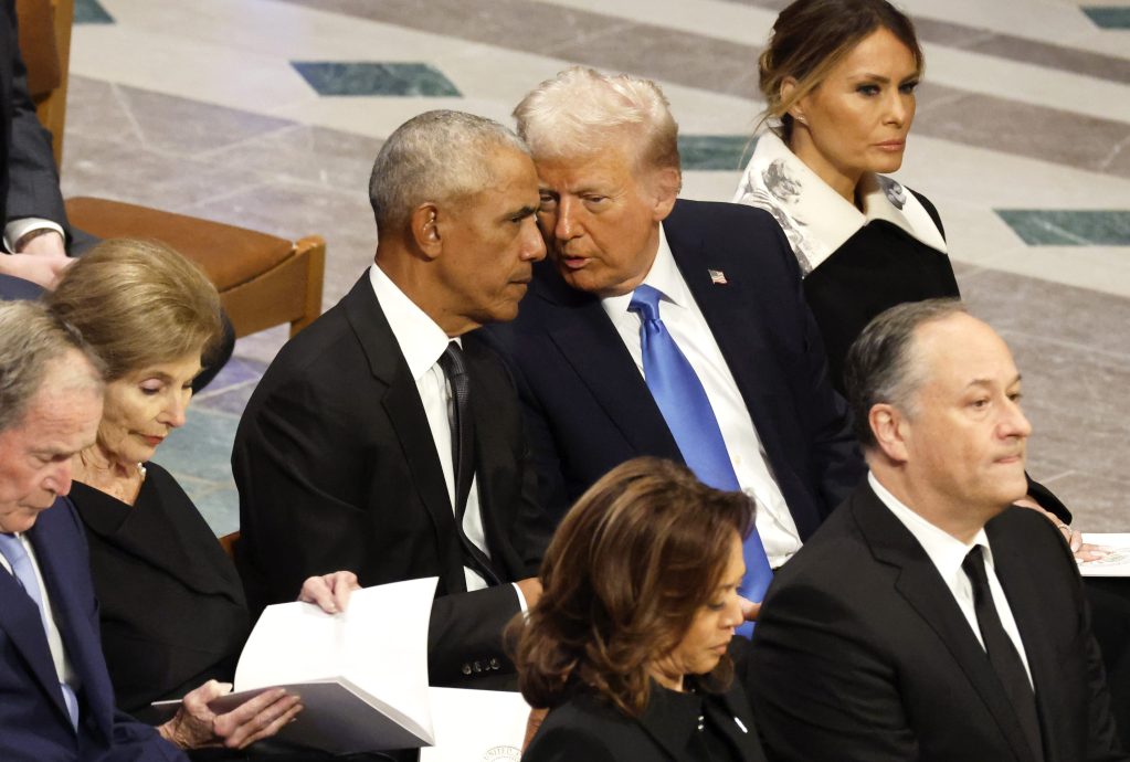 What Were Trump & Obama Talking About at Carter’s Funeral? Photos