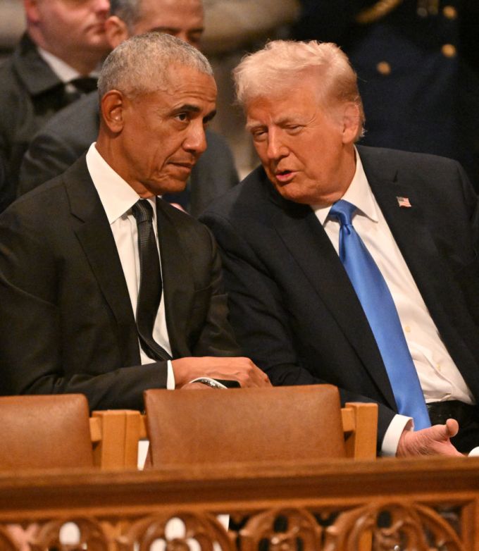 What Were Trump & Obama Talking About at Carter’s Funeral? Photos